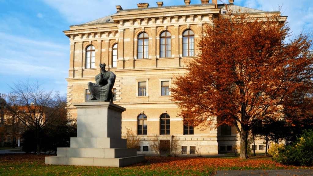 Zagreb, Croatia in October - orange leaves surrounding a monument